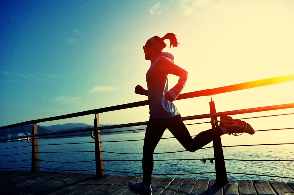 Woman Running on the Bridge