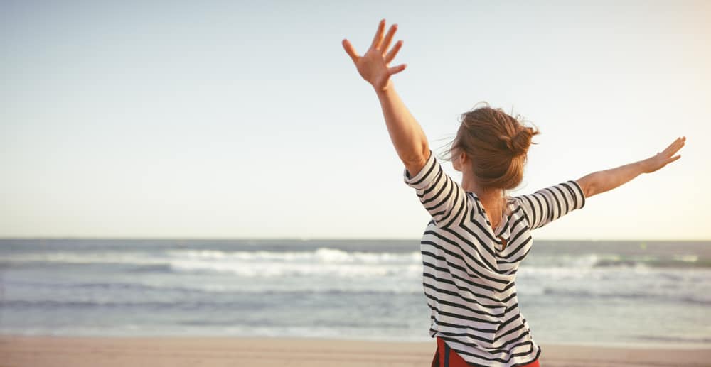 Happy woman at the beach