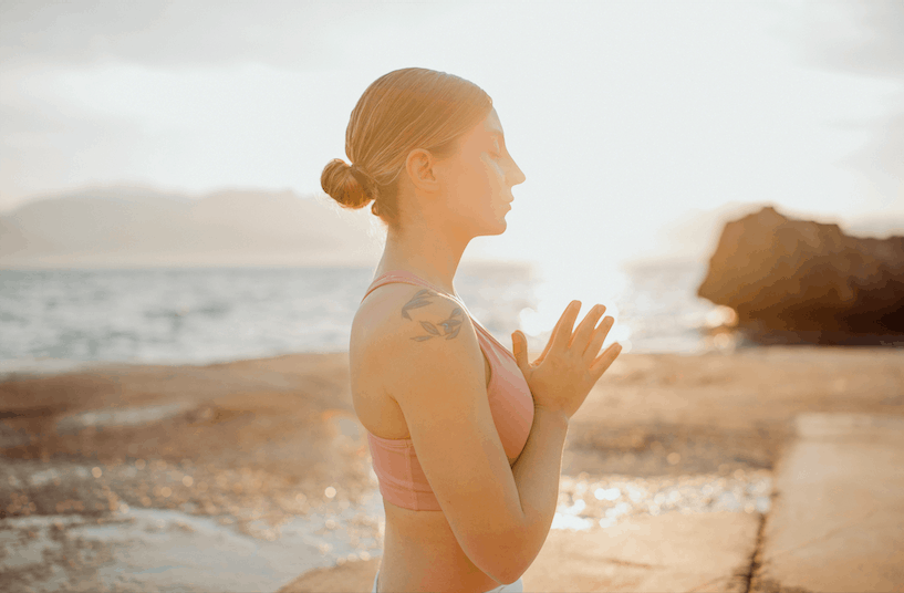 Meditation at the beach sunset