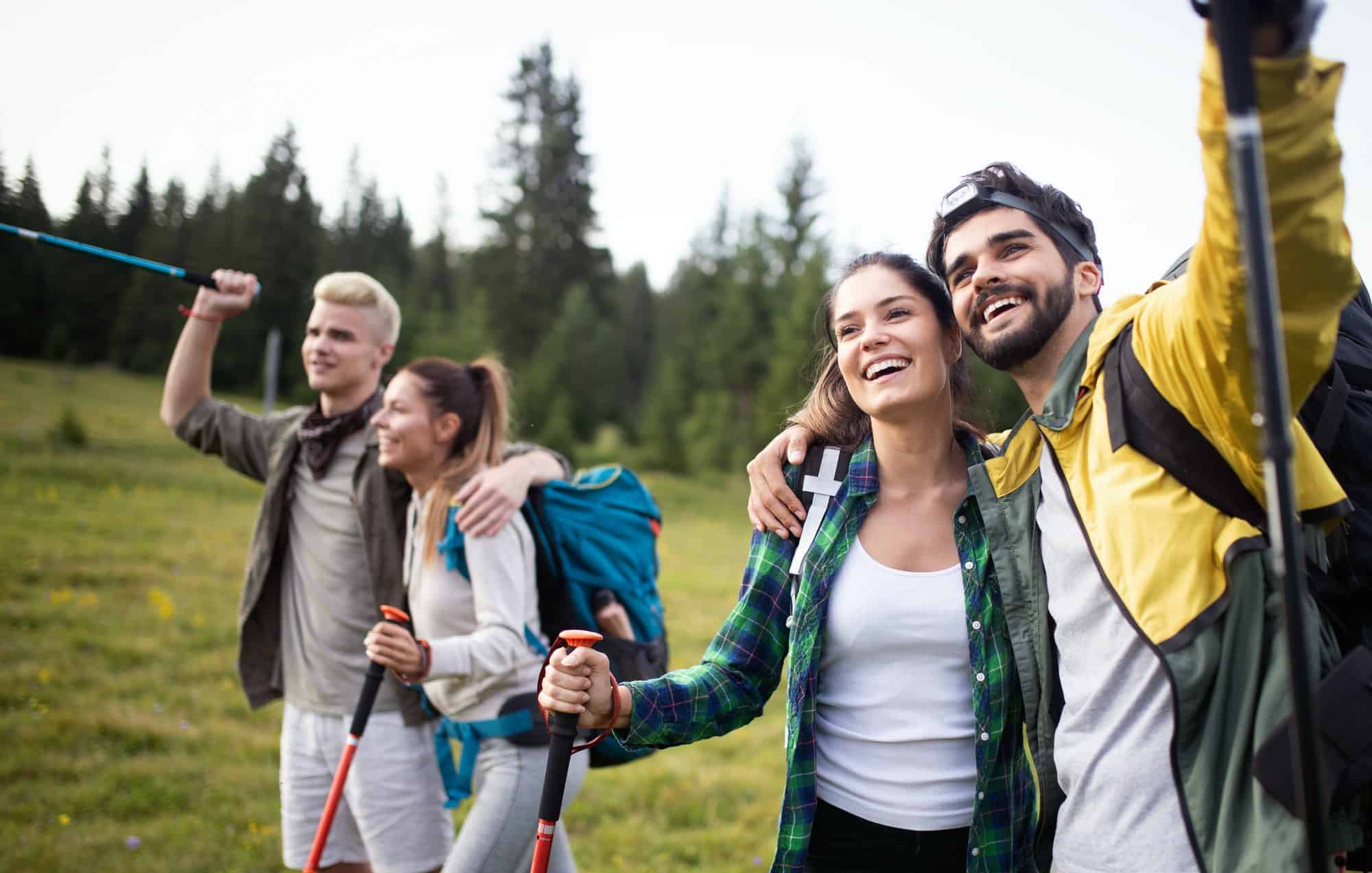 friends hiking together outdoors exploring the wilderness