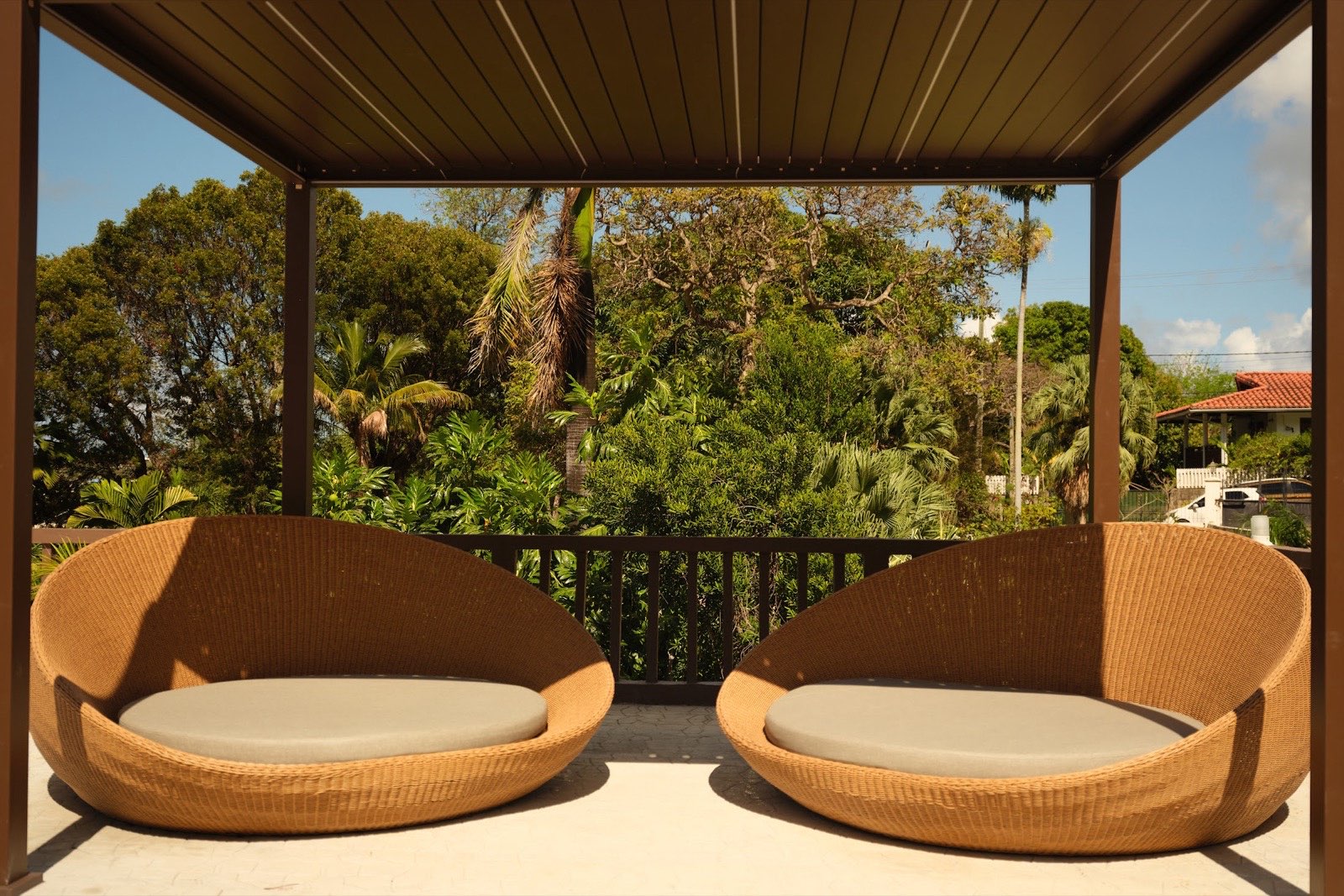 Garden daybeds in the outdoor lounge at TheLifeCo St. Lucia