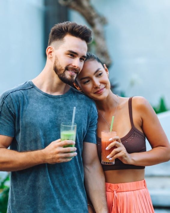 European,Beautiful,Couple,With,Smoothies,And,Organic,Rice,Straws,Are